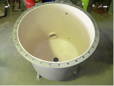 Flange face rebated to allow for coating application and prevent crevice corrosion